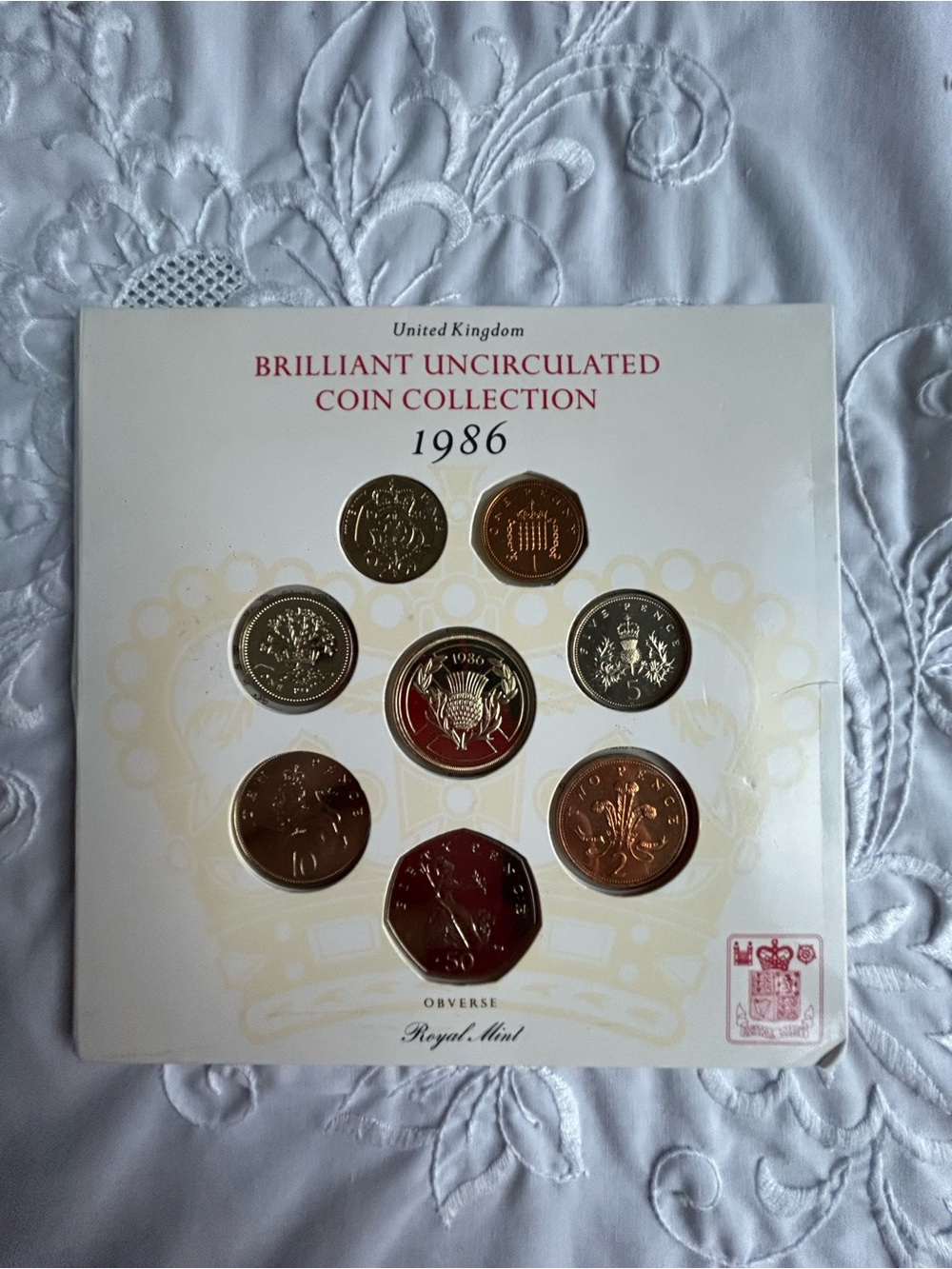 1986 Brilliant Uncirculated Coin Collection by Royal Mint - White and Gold